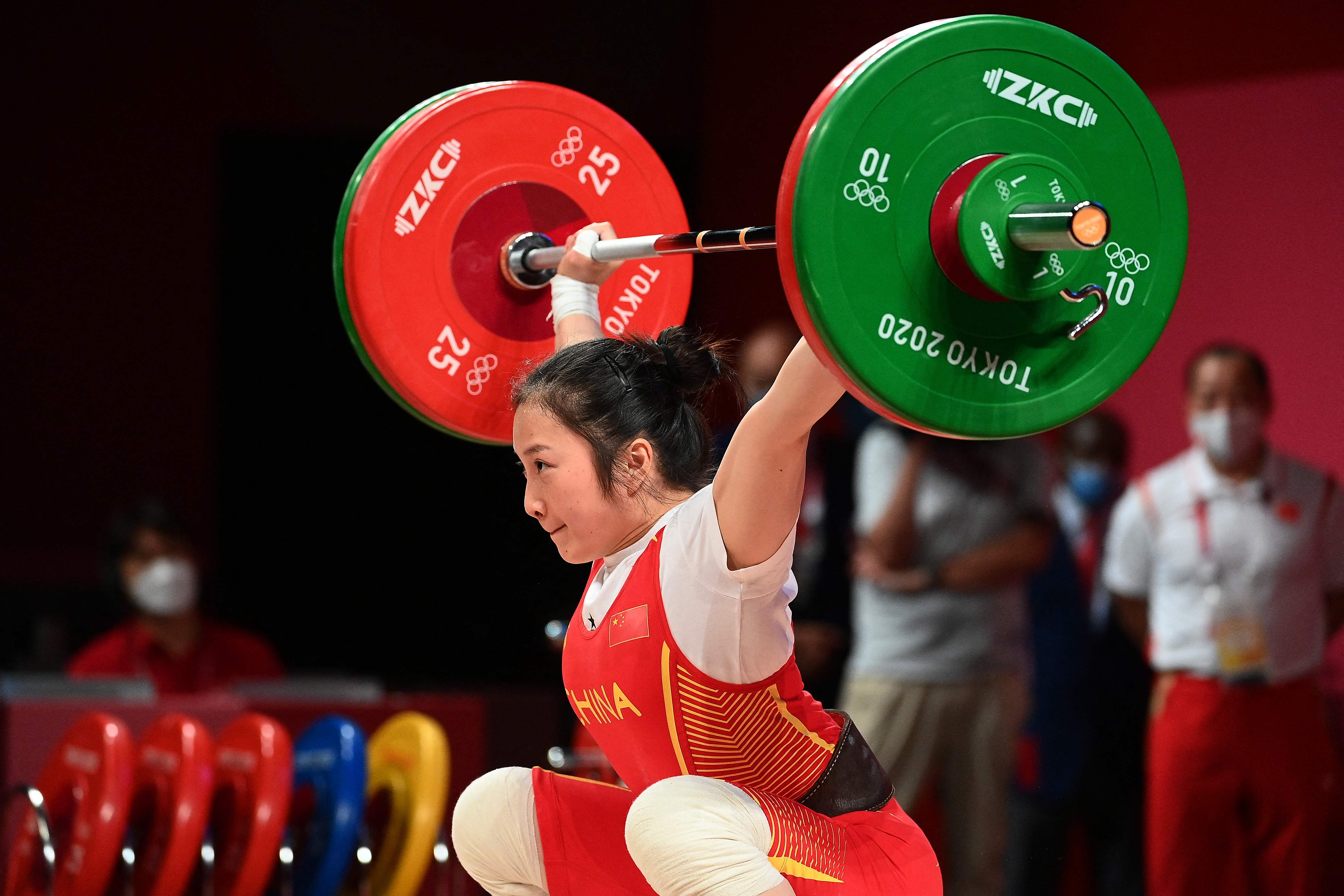 中国女子举重冠军王明娟_举重冠军王明娟简历_举重女子冠军中国王明娟照片